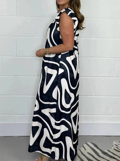 Full Size Printed Wide - Leg Jumpsuit with Flutter Sleeves Plus Size - Couture Envy