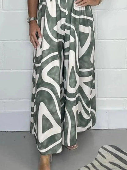 Full Size Printed Wide - Leg Jumpsuit with Flutter Sleeves Plus Size - Couture Envy
