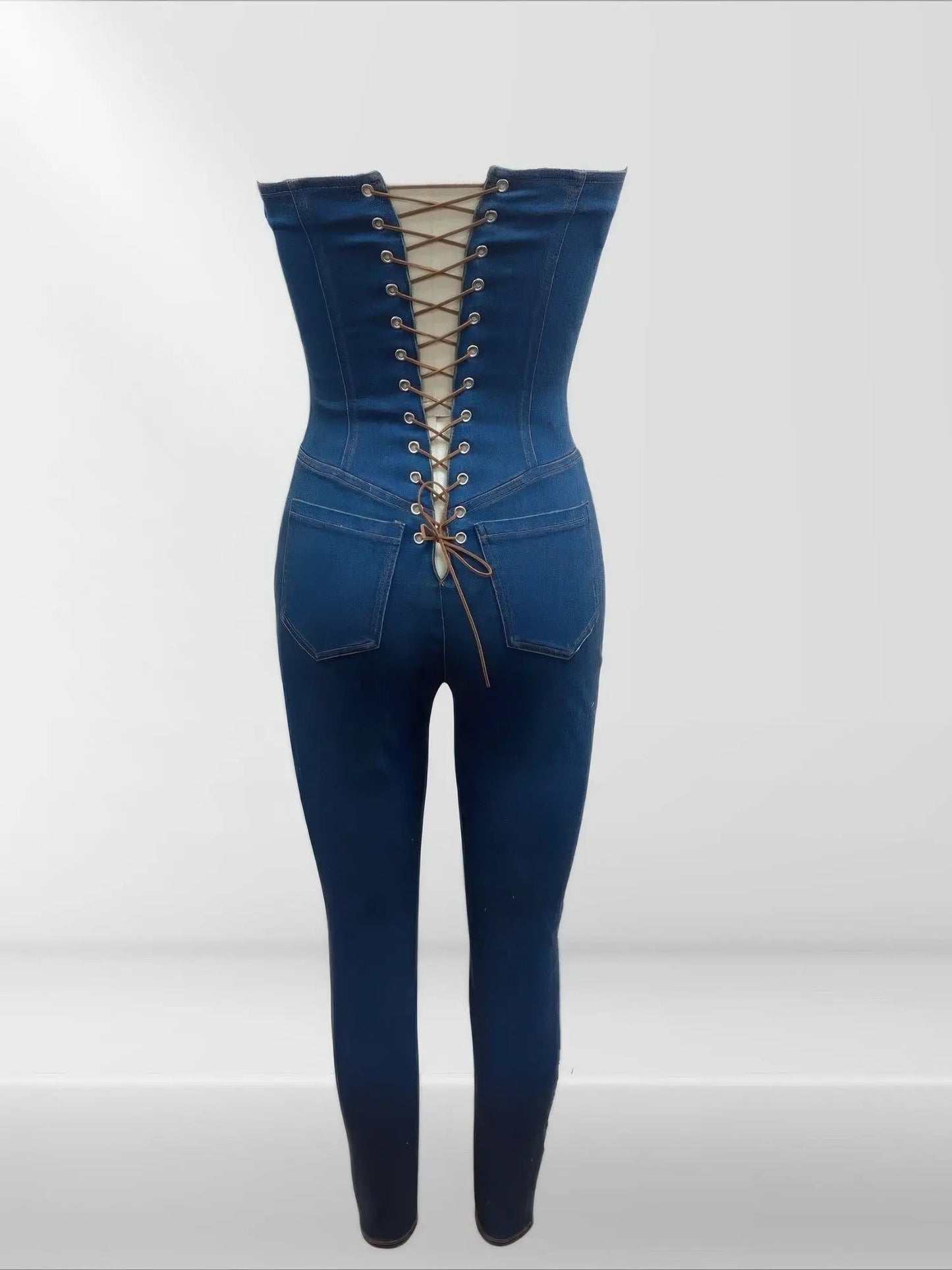 Strapless Denim Jumpsuit With Lace Up Back - Couture Envy